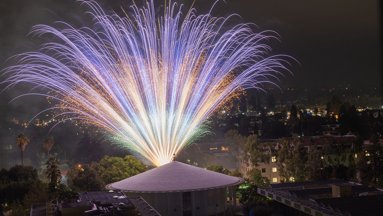 A photo of fireworks over Beckman Auditorium