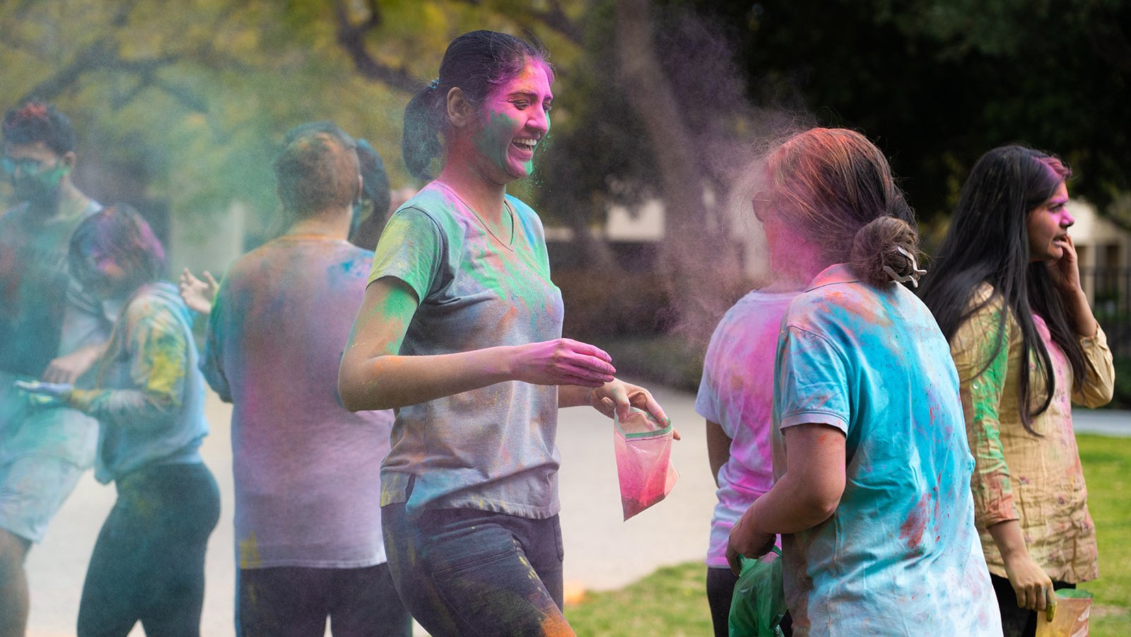 A photo of people at Beckman Mall celebrating Holi