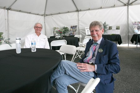 Andy Boden, deputy director of Palomar Observatory is seated at a table next to Ed Krupp, director of Griffith Observatory.