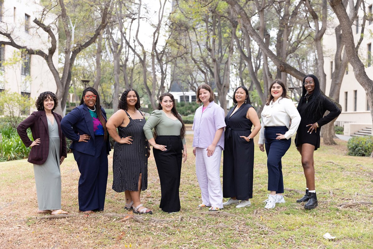 A group of eight CCID staff members standing in semicircle