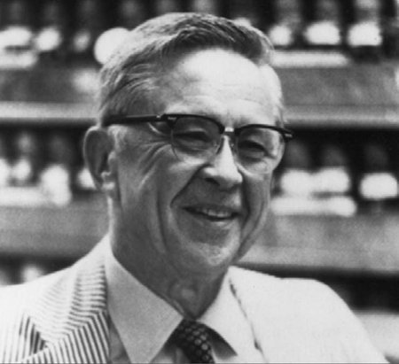 Scanned old photo of man in glasses