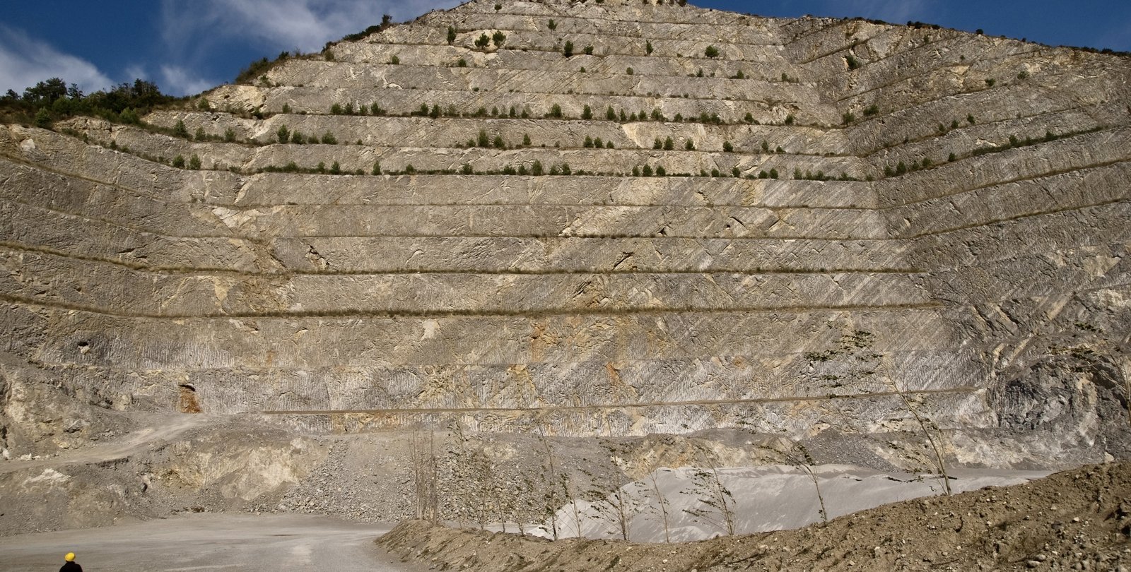 A pyramid shaped rocky cut into the ground